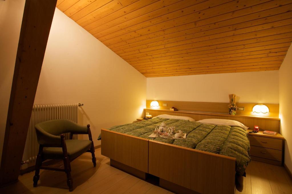 Albergo Bellaria Carano  Rum bild